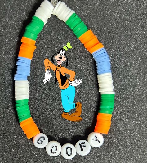 Mickey Mouse (Mickey Mouse Clubhouse) Heishi Bracelet #handmadebracelet #heishibracelets #beadedbracelets #bracelets #personalizedbracelets #personalizedbracelet #mickeymouseclubhouse #mickeymousefriends #mickeymouse #mickeymouseclub #minniemouse #minniemousebracelet #mickeymousebracelet #mickeymousebracelets #goofy #goofymickeymouse #goofybracelet Disney Clay Bead Bracelet Ideas, Bracelet Ideas Disney, Heishi Bracelet Ideas, Clay Bead Bracelet Ideas, Bead Bracelet Ideas, Pony Bead Bracelets, Heishi Bracelet, Clay Bead Bracelet, Mickey Mouse Club