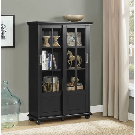 Breakwater Bay Lanz Display Cabinet & Reviews | Wayfair.co.uk Black Display Cabinet, Black Bookshelf, 4 Shelf Bookcase, Furnitur Ruang Keluarga, Black Bookcase, Bookcase With Glass Doors, Glass Panel Door, Storage Cabinet Shelves, Sliding Glass Doors