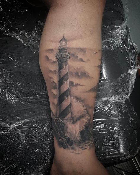 Lighthouse Shin Tattoo, Lighthouse With Waves Tattoo, Lighthouse Tattoo For Women, Mens Lighthouse Tattoo, Lighthouse Forearm Tattoo, Lighthouse On Cliff Tattoo, Hatteras Lighthouse Tattoo, Cape Hatteras Lighthouse Tattoo, Cliffs Tattoo