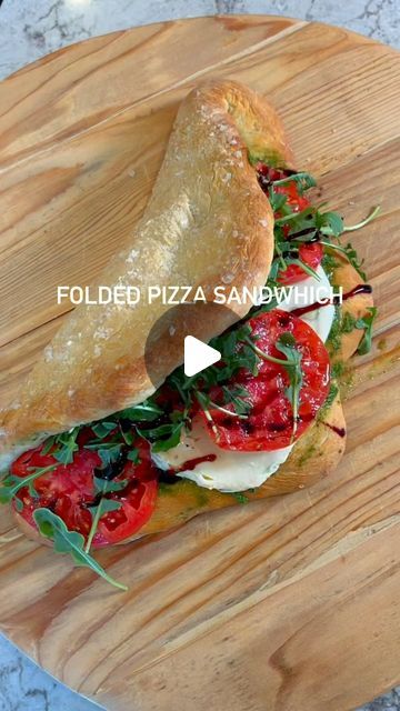 Sherri Davidson on Instagram: "FOLDED PIZZA SANDWHICH: 

INGREDIENTS:
- Pizza Dough 
- Pesto
- Mozzarella (sliced)
- Tomatoes (sliced)
- Handful of arugula
- Olive Oil + Balsamic @wearebrightland 
- flaky salt @maldonsalt 

Roll and stretch out your dough as you would for pizza. Drizzle all over with olive oil, then fold in half and drizzle the top with olive oil and flaky sea salt. Bake in the oven at 475 for 12-15 minutes. Stuff with pesto, mozzarella, tomatoes + arugula. Cut in half and enjoy!! This is perfect for hosting. 

#pizzalovers #pizza #pizzasandwich #mozzarella #heirloom #tomatoes #viral #viralreels #viralrecipes #goodfood #easyrecipes #sogood #delicious #foodie #foodlovers #foldedpizza #dough" Folded Pizza, Olive Oil Pizza, Pesto Mozzarella, Sliced Tomatoes, Pizza Sandwich, Flaky Salt, Sliced Tomato, Pizza Lovers, Heirloom Tomatoes