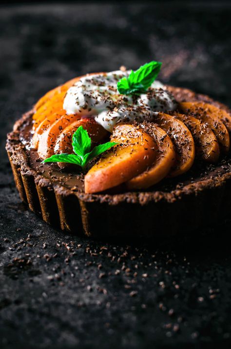 These easy vegan chocolate tarts are made with a gluten free oat and almond base and topped with sweet, summery apricots for a beautiful & simple dessert. The easy press-in base and quick ganache filling makes for a low stress treat. #vegan #summer #chocolate #dairyfree #eggfree #tarts Apricot Tart, Chocolate Tarts, Vegan Chocolate Recipes, Vegan Pie, Raw Desserts, English Breakfast, Best Vegan Recipes, Chocolate Tart, Vegan Dessert Recipes