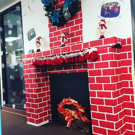 Outta boxes Christmas Box Archway, Christmas Cardboard Mailbox, Box Chimney Christmas, Fireplace Bulletin Board, Christmas Fireplace Cardboard, Paper Fireplace, Cardboard Box Fireplace Christmas, Black Bulletin Board, New Year's Decorations