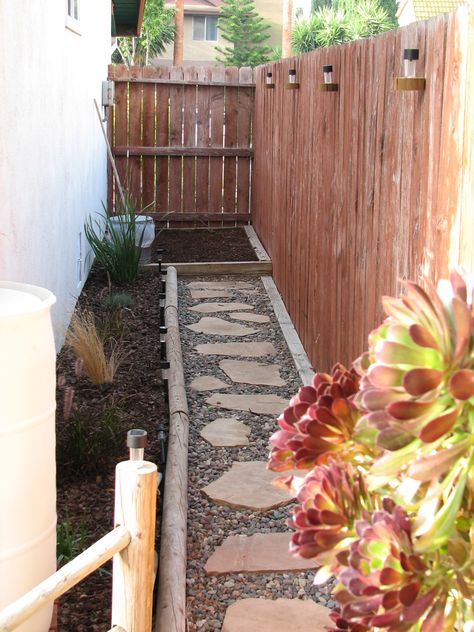 Side yard dog toilet area. Dog Side Yard, Dog Toilet Area Garden, Diy Dog Run Side Yard, Dog Poop Area, Dog Run Side Yard, Porch Potty, Diy Dog Run, Dog Potty Area, Dog Friendly Backyard