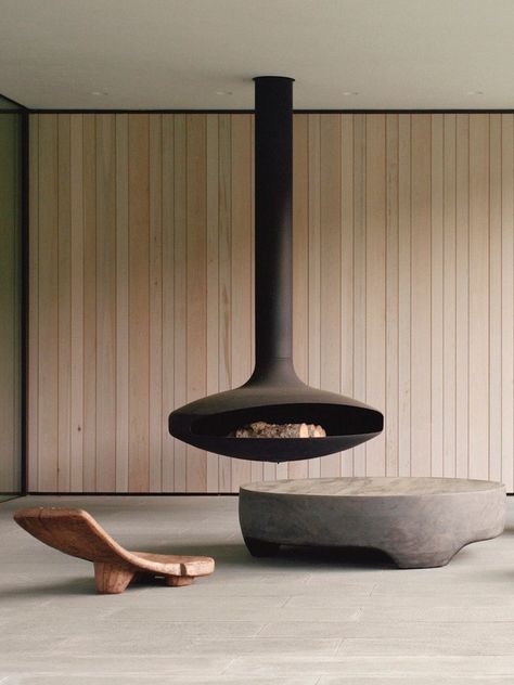 Insider's Guide to Artisanal Suspended Fireplaces | est living Dream Fireplace, Suspended Fireplace, Concrete Stool, Outdoor Fireplaces, Est Living, Concrete Furniture, Timber Cladding, Storey Homes, New England Style