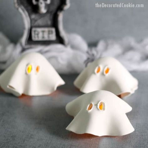 Ever since I bought some air-dry clay to make this fairy house mason jar, I’ve been wondering why I didn’t discover the stuff sooner. You can make all kinds of things with it, and it’s very user-friendly. These ghost tea lights are so simple and easy to make, you could have a whole flock...Read More » Air Dry Clay Ghost, Project Craft Ideas, Easy Halloween Decor, Clay Ghost, Halloween Luminaries, Halloween Clay, Diy Air Dry Clay, Easy Halloween Decorations, Air Dry Clay Projects