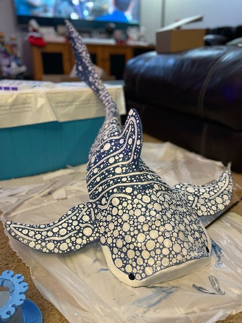 This was right after i finished painting it <3 I’ll probably post the work in progress photos later Paper Mache Sea Creatures Art Projects, Diy Room Decor Ocean Theme, Stingray Paper Mache, Cardboard Whale Shark Template, Diy Whale Shark, Paper Mache Manta Ray, Paper Mache Stingray, Whale Shark Paper Mache, Paper Mache Whale Shark