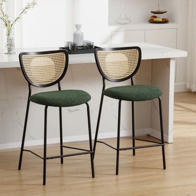 Elevate the elegance of your dining space with our chic rattan stools, which effortlessly blend modern sophistication and enduring appeal. The black metal frame adds a sleek and contemporary touch, while the synthetic rattan backrest introduces a natural, refined element. The stools are upholstered in Boucle fabric, offering a variety of color options, including White, Black, and Dark Green, to suit your individual style preferences. Whether you're furnishing an elegant home, dining room, kitche Mid Century Modern Barstools, Mid Century Modern Bar Stools, Boutique Restaurant, Bar Stools For Kitchen, Mid Century Bar Stools, Green Bar Stools, Rattan Counter Stools, Mid Century Modern Bar, Apt Decor