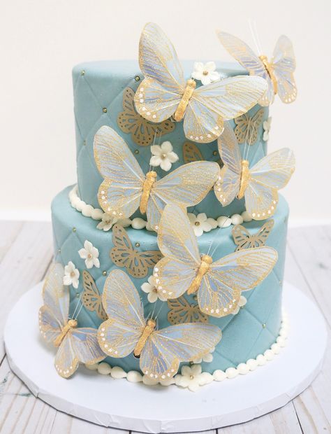 Navy Blue Butterfly Cake, Light Blue Butterfly Cake, Blue Cake Butterfly, Cake With Gold Butterflies, White Cake With Gold Butterflies, Light Blue Wedding Cake, Whimsical Wedding Cakes, Butterfly Wedding Cake, 2 Tier Wedding Cakes