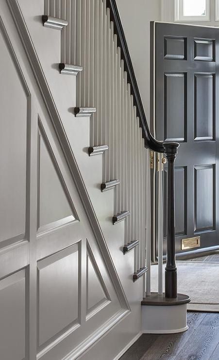 Black Entry Door, Banister Remodel, Black Entry Doors, Dark Oak Flooring, Wood Spindles, Victorian Hallway, Traditional Staircase, House Staircase, Hallway Inspiration