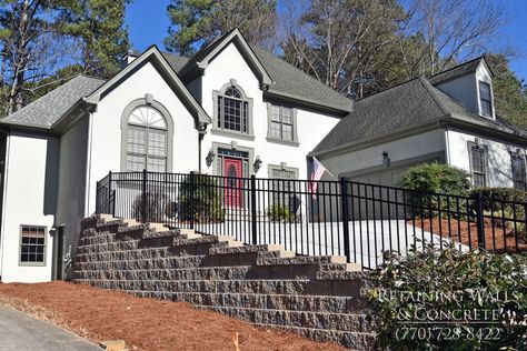 Here is the new block retaining wall with safety rails. Retaining Wall Railing, Retaining Wall Driveway, Driveway Retaining Wall, Retaining Wall Fence, Block Retaining Wall, Wall Concrete, Concrete Retaining Walls, Wall Railing, Concrete Contractor