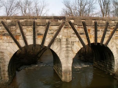 Adrian Railroad Bridge, Over South Branch River Raisin Adrian: Lenawee County, Michigan, Stone Semicircular Deck Arch, 1867, A large two-span stone arch bridge built in 1867, this is a very old bridge for Michigan. Stone Arch Bridge, Railroad Bridge, Vintage Stores, Arch Bridge, Stone Arch, Bridge Building, State Of Michigan, Old Bridge, Pure Michigan