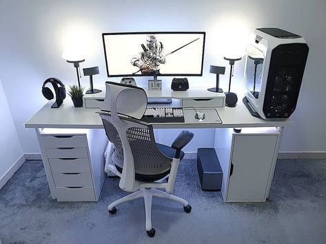 Modern computer setup with large monitor, white desk, ergonomic chair, and various accessories including speakers, headset, and desktop PC. White Desk Setup, Chambre Inspo, Gaming Desk Setup, Gaming Computer Desk, Computer Desk Setup, Home Studio Setup, Pc Desk, Bedroom Setup, Gaming Chairs