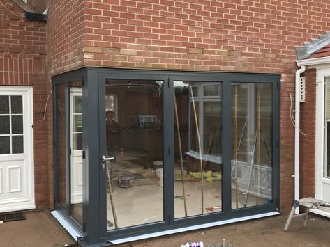 This corner post Origin bi fold door was fitted by our team in a customers dining room to allow more light to pass into the property. #BiFoldDoor #BifoldDoor #BiFolds #CornerBiFoldDoor #CornerPostBiFoldDoor #CornerPost #AnthraciteGrey #ThreePaneBiFoldDoor #OriginBiFoldDoor #OriginBiFold #OriginBiFolds #Basfords #BasfordsEffect #BasfordsDifference Grey French Doors, Corner Bifold Doors, Garden Room Extensions, Corner Door, Glass Doors Patio, Grey Patio, Bi Fold Door, Room Extensions, Open Plan Kitchen Living Room