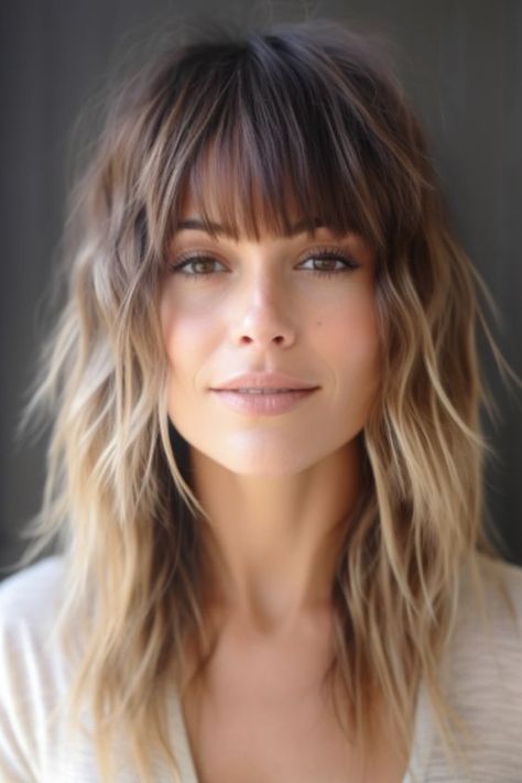 Embrace the shaggy long layers with fringe for a relaxed and bohemian look. This layered haircut is ideal for thick hair, offering movement and dimension. Click here to check out more layered haircuts and hairstyles for long hair. Long Hair Framed Face Haircuts, Short Hair Bangs Highlights, Womens Hair With Bangs, Light Brown Shag, 2024 Haircuts, Shaggy Long Hair, Blonde Hair Transformations, Long Shag Haircut, Hairstyles For Medium Length Hair