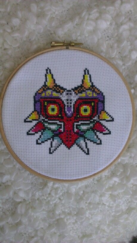 Cross Stitch Majora's Mask Majoras Mask Moon Tattoo, Crochet Majoras Mask, Majoras Mask Crochet Pattern, Majoras Mask Observatory, Majoras Mask Cross Stitch, Stitch Work, Majoras Mask, Credit Card Debit, Game Room Decor