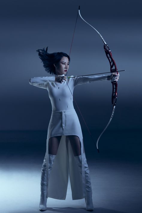 Arrows shooting concept #shooting #arrow #concept #photoshoot #art #artphoto #blueconcept Now And Arrow Pose, Archery Equipment Aesthetic, Shooting Bow And Arrow Pose, Pole Arm Pose Reference, Bow And Arrow Photoshoot, Archery Photoshoot Senior Pics, Person Holding Bow And Arrow Reference, Archer Reference Pose, Bow And Arrow Reference