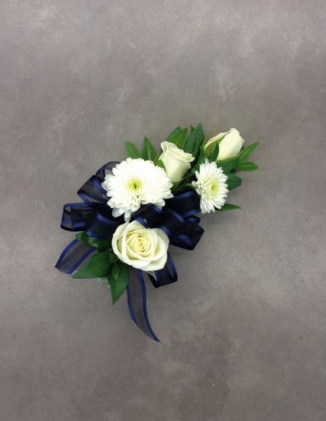 White rose and mum corsage with navy blue bow by Nancy at Belton Hyvee. Navy Corsage, Mum Corsage, Green Boutonniere, Prom Flowers Corsage, White Corsage, Boutonnieres Prom, Bride Headpiece, Prom Flowers, Flower Corsage