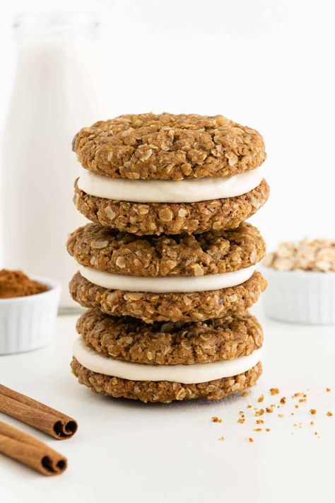 Homemade vegan oatmeal cream pies are the most delicious cookie sandwiches! A sweet vanilla frosting is sandwiched between two soft and chewy oatmeal cookies. It's a gluten-free, dairy-free, and healthier copycat recipe for the classic Little Debbie dessert! #vegancookies #cookies #cookierecipes #vegandessert #glutenfreecookies #cookiesandwich #veganrecipes #littledebbie Creme Pie Recipe, Oatmeal Cream Pies Recipe, Carrot Cake Sandwich Cookies, Carrot Desserts, Celebrating Sweets, Creme Pie, Oatmeal Creme Pie, Bread Booze Bacon, Cake Sandwich