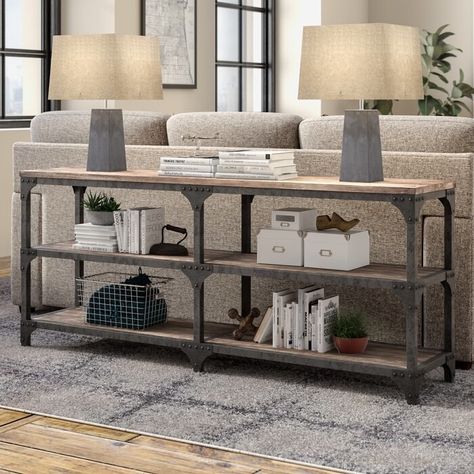 Or this larger console table that fits perfectly behind free-floating couches. The industrial base and weathered oak top give it an antique look. Sofa Table Decor, Gorgeous Sofas, Console Table Decorating, Tuscan Decorating, Wood Console Table, Wood Console, Sofa Tables, A Living Room, Farmhouse Living