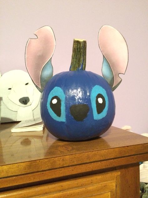 Stitch inspired pumpkin painting. Stitch And Angel Pumpkin Painting, Lilo And Stitch Pumpkin, Lilo And Stitch Pumpkin Painting, Pumpkin Painting Ideas Stitch, Stitch Pumpkin Idea, Stitch Pumpkin Painting Ideas, Stitch Painted Pumpkin, Stitch Pumpkin Painting, Disney Stitch Pumpkin Stencil