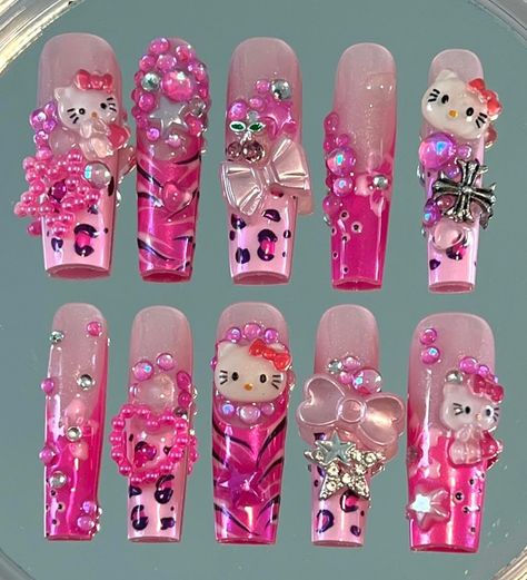 Pink Hello Kitty junk set 🩷🎀🐈 . Recreation of @nissanailedit . . . #pressonnails #gelxnails #pinknails #frenchtipnails #cheetahprintnails #y2knails #charmnails #junknails #hellokittynails #sanrionnails Hello Kitty X Spiderman Nails, Hawaiian Hello Kitty Nails, Hello Kitty Charm Nails, Cheetah Print Nails, Junk Nails, Hello Kitty Nails, Y2k Nails, Pink Hello Kitty, Nails Inspo