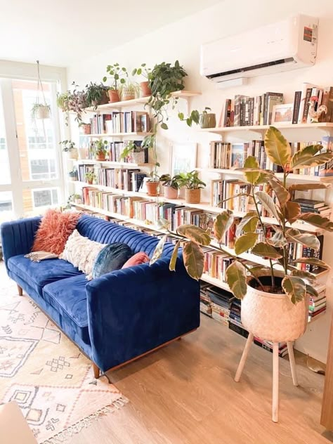 Angled Sofa Layout, Bookish Apartment Aesthetic, Bookshelf Behind Sofa, Bookshelves In Living Room, Home Library Design, Home Libraries, Apartment Inspiration, Apartment Living Room, Living Room Inspo