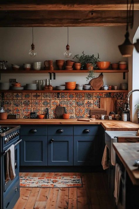 61 Earthy Kitchen Ideas for a Cozy, Organic Look Terracotta And Navy Kitchen, Oak And Navy Kitchen, Blue Kitchen Color Schemes, Bold Kitchen Cabinet Colors, Blue Tiles Kitchen, Blue And Copper Kitchen, Blue And Wood Kitchen, Blue Tile Kitchen, Blue And Orange Kitchen