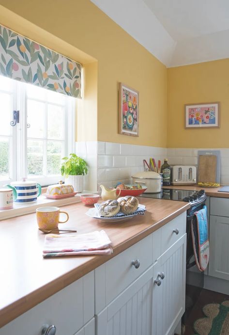 'Living with colour around us has been transformative - this is such a happy home!' Colourful Family Home, Colourful Townhouse, Primary Colour Kitchen, Colourful Kitchen Splashback, Susie Watson Pink Tiles Kitchen, Ikea Dining Table, Colourful Homes, Happy Colours, Dog Table