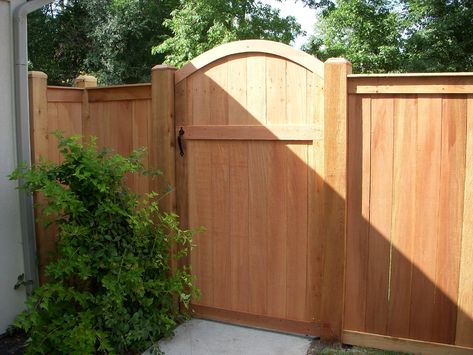 Solid, traditional wood fence w/ arched gate | aspenfence Arch Fence Gate, Arched Fence Gate, Decorative Fence Gate, Arched Wooden Gate, Arched Gate Fence, Wood Fences And Gates, Garden Gate Wood, Wood Fence With Gate, Fence With Arched Gate