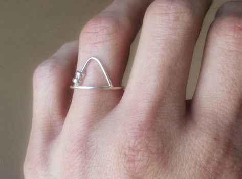 Triangle fidget ring. The 2 little sterling silver beads move along both sides of the triangle, and are 3mm. The sterling silver band is 1mm wide. *Each ring is made to order, and they are all made by hand, so please allow for slight variations. *When ordering, order your regular size. I Worry Ring, Fidget Rings, The Triangle, Spinner Ring, Spinner Rings, Sterling Silver Bands, Sterling Silver Bead, Silver Band, Silver Beads