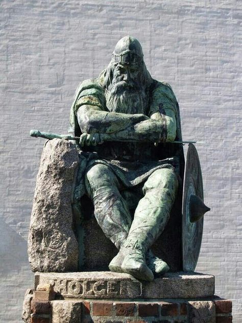 Holger Dansk (Holger the Dane). This is Denmark's hero.  He never lost a battle in his life. He was a mercenary for the Franco-Roman court. An excellent warrior. He embodied the rigor and percervierence of the true Viking spirit. When he missed Danmark he walked from France to Danmark and sat to rest.  And there he sits at the Castle Kronborg in Helsingor Danmark, resting. . .  He vowed that he will awaken when Danmark is in trouble. Statue, Stone