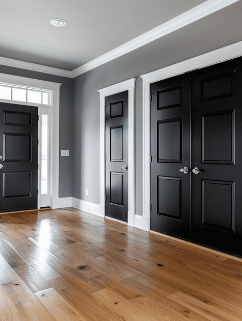 What Color To Paint Interior Doors (6 Suggestions With Pictures) Black Interior Door With White Trim, Gray Walls And Black Doors, Gray Walls With Black Doors, Dark Gray Interior Doors With White Trim, Home Colors Ideas, Interior Door Wallpaper, Living Room With Black Doors, Grey Walls Black Doors White Trim, Grey Walls With Black Doors