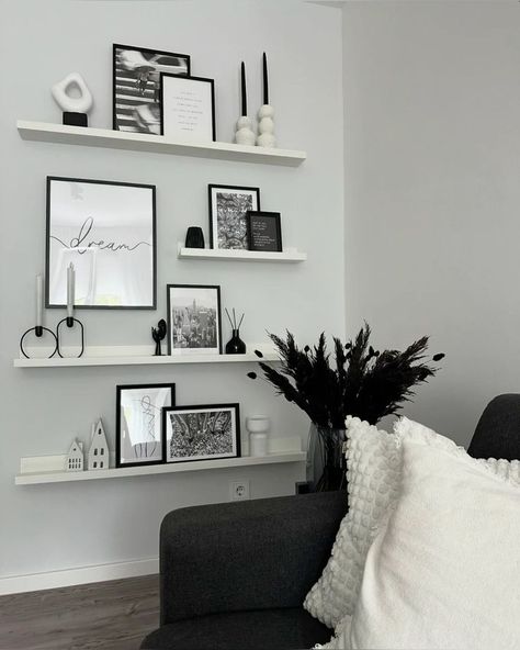 Light Grey Aesthetic Living Room, Black White And Grey House Decor, Photo Wall On Shelves, Small Living Room Ideas White Walls, Black And White Front Room Ideas, Black White And Silver Living Room Decor, Ikea Picture Frame Wall Ideas, Black White Aesthetic Living Room, Modern Black White Grey Living Room