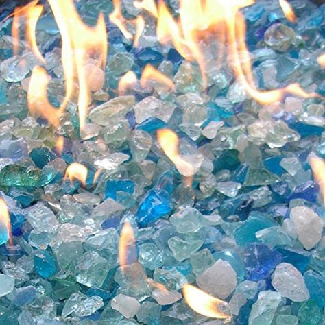 Best pebbles in the country. A patio with gravel and pebbles is an excellent addition to any home not only because of the added beauty it gives but also because of the multiple purposes it can offer. Firepit Glass, Fire Pit Glass, Blue Rocks, Colors Of Fire, Glass Fire Pit, Dragon Glass, Patio Heaters, Fire Pit Accessories, Glass Fireplace