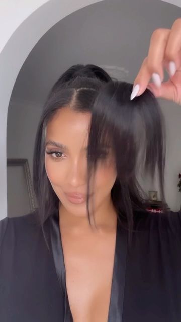 Julissa Bermudez on Instagram: "I won’t cut bangs, but I’ll clip them in 💁🏽‍♀️😆 Found this bang hair piece on Amazon (search: NAYOO bang clip in bang) the color I’m wearing is natural black Tancho pomade stick (Amazon) @tresemme Extra hold hairspray number 4 @neurohair Neuro halo titanium flat iron" How To Fake Bangs With Long Hair, Bang Hair Extensions, How To Give Yourself Fake Bangs, Clip On Bangs For Black Women, Cute Ways To Clip Back Bangs, Faux Bangs With Bun, Clip Bangs Back, Bangs Clip In, Clip In Bangs