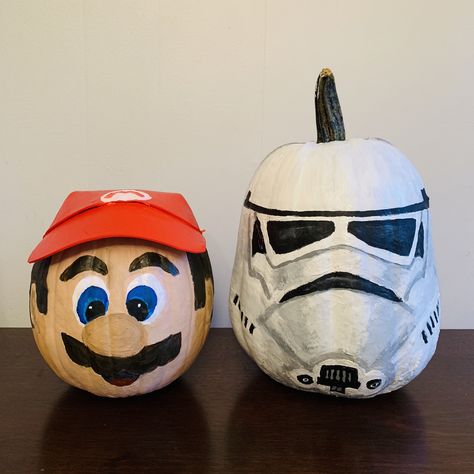 Painted pumpkins. Mario and storm trooper. #halloween #paintedpumpkins #mario #stormtrooper Storm Trooper Pumpkin, Mario Pumpkin Painting, Mario Pumpkin, Disney Pumpkin Painting, Character Pumpkins, Disney Pumpkin, Pumpkin Carving Templates, Pumpkin Ideas, Pumpkin Painting