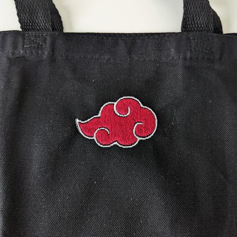 Show-off your favourite anime or video games on a embroidery Totes! About the Totes The totes are 35cm * 40cm, available in white or black All totes are embroiled in Canada Akatsuki Embroidery, Black Tote Bag Embroidery, Naruto Bag, Cloud Embroidery, Akatsuki Cloud, Anime Tote Bag, Outfit Pieces, Embroidery Bags, Crochet Bracelet