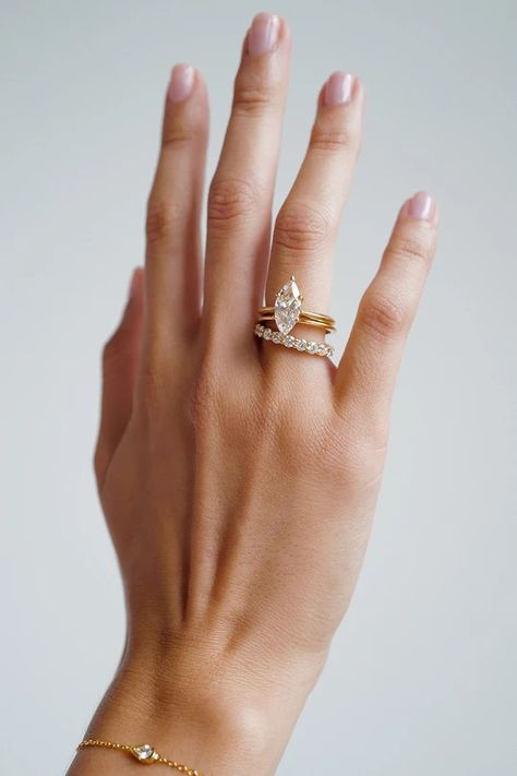 Marquise Engagement Ring With Emerald Band, Marquise Wedding Set Simple, Marquee Engagement Ring With Wedding Band, Marquis Gold Engagement Ring, Pointy Engagement Rings, Marquise Engagement Ring With Thick Band, Marquee Ring Engagement, Engagement Rings Thicker Band, Gold Marquise Engagement Ring With Band