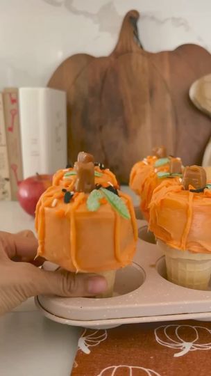 2.6M views · 20K reactions | Let’s make the Funfetti Pumpkin Upside Down Cupcake Cones!

Ingredients: Funfetti Halloween Cake Mix, ice cream cones, Funfetti Halloween frosting, HARIBO sour streamers, Werther’s Soft Caramels, piping bag and tip

1. Preheat the oven to 350 degrees. Make the batter using the box instructions. Grease the pan and pour in the funfetti batter into the cupcake tins and then top with cones.

2. Bake for 17-22 minutes.

4. Let them cool off then frost with Halloween funfetti frosting, add a caramel for the stem, pipe the lines for the pumpkin, and cut leaves with green HARIBO sour steamers and add sprinkles on top! | Michelle Home decor  | Michelle Home decor  · Original audio Halloween Funfetti, Funfetti Frosting, Soft Caramels, Cupcake Cones, Cupcake Tins, Soft Caramel, Piping Bag, Halloween Cake, Ice Cream Cones