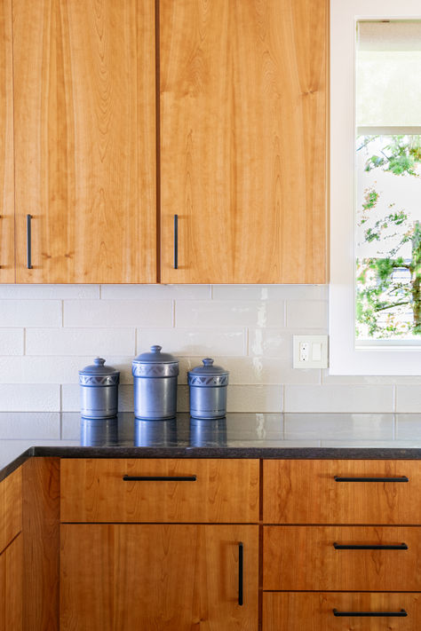 Natural kitchen design and wood stain cabinets will never go out of style! These are timeless looks that can also feel modern. using a slab style cabinet door is a great way to take this style and give it a modern twist. Specializing in affordable kitchen remodeling. Wood reconditioning “tune-ups”, cabinet refacing and redooring, custom cabinetry. Frameless Cabinets Kitchen, Wood Stain Cabinets, Natural Kitchens, Natural Kitchen Design, Slab Kitchen Cabinets, Stain Cabinets, Slab Cabinet Doors, Natural Wood Kitchen Cabinets, Kitchen Slab