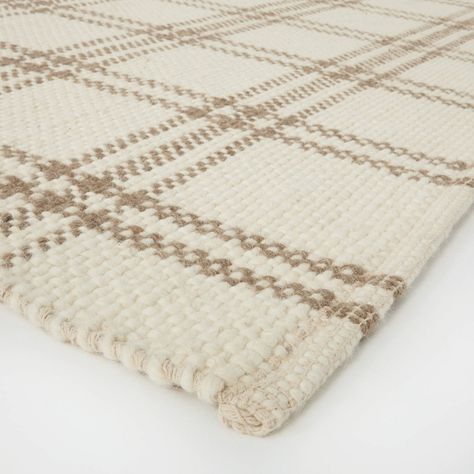 Transform your floor space with this Neutral Cottonwood Plaid Wool and Cotton Area Rug from Threshold™ designed with Studio McGee. This handmade Goodweave certified area rug is a great indoor accent and showcases a woven plaid pattern in neutral colors for casual texture and classic appeal. The wool and cotton construction adds comfort and warmth to your flooring for a great feel underfoot. Plus, it has a flat pile height that's perfect for frequently used areas like your living room, hallway or Mcgee Target, Plaid Area Rug, Studio Mcgee Target, Plaid Rug, Rug Cream, Target Rug, Cotton Area Rug, Cotton Textile, Studio Mcgee