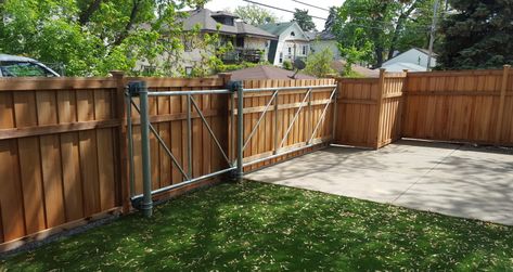 The wood faced cantilever gate provides a large access opening in any fence while keeping a seamless look on the outside of the fence and gate. Sliding Fence Gate, Cantilever Gate, Driveway Gate Diy, Driveway Fence, Wood Fence Gates, Wood Privacy Fence, Fence Gate Design, Yard Fence, Driveway Landscaping