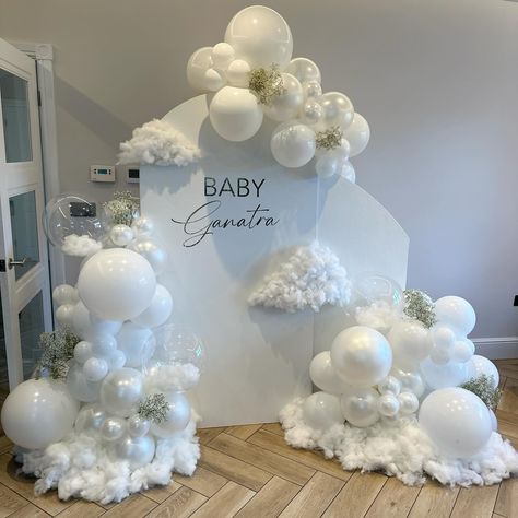 We're on cloud nine baby shower backdrop and balloon decorations in white color Clouds Birthday Decoration, In The Clouds Gender Reveal, Cloud Balloon Decor, Cloud Nine Decorations, Cloud Nine Table Centerpieces, On Cloud Nine Balloon Arch, Cloud Nine Baby Shower Theme Girl, On Cloud Nine Backdrop, Cloud Nine Gender Reveal