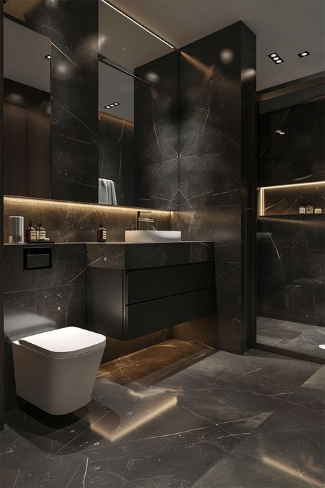 Luxury Defined • Black marble walls with white veining reach from floor to ceiling • Illuminated mirror adds modern sophistication • Wall-mounted toilet and floating vanity with white basin enhance the sleek design • Golden under-vanity lighting complements the marble's hues • Glass shower stall and warm recessed lighting give a spacious feel to the opulent bathroom. Black Downstairs Toilet Ideas, Floating Ceiling Design, Black Marble Shower Bathroom, Industrial Chic Bathroom, Nero Marquina Bathroom, Bathroom Black Marble, Opulent Bathroom, Glass Shower Stall, Mafia House Aesthetic