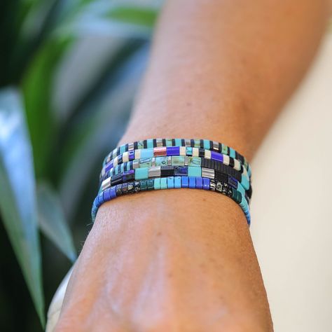 View All Bracelet Stacks : https://etsy.me/4abyDdo Our Nautilus Stack includes FIVE (yes, 5!) tila bead bracelets with hues of blue, black, and silver. The Nautilus stack comes in sizes 5.75 inches through 8.50 inches (XXS-5XL) F E A T U R E S * Durable- Made With Expensive Clear Elastic And Glass Tile Beads * Waterproof - Swim, Sweat, Dance - Anything You Can Do Our Bracelets Will Do With You! * Comfy- Mack & Rex Minimalist Bracelets Lay Flat To Your Wrists Without Pinching. * 30 Day Guarantee Tila Bead Bracelets, Bead Bracelet Stack, Stacked Beaded Bracelets, Stackable Beaded Bracelets, The Nautilus, Black Beaded Bracelets, Mens Leather Bracelet, Minimalist Bracelet, Bead Bracelets