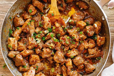 Juicy Garlic Pork Stir-Fry Recipe – How to Make Stir-fried Pork — Eatwell101 Pork Chunks, Recipes For Pork, Stir Fry Meat, Pork Stir Fry Recipes, Honey Garlic Pork, Recipe For Pork, Pork Bites, Garlic Pork, Ground Beef And Cabbage