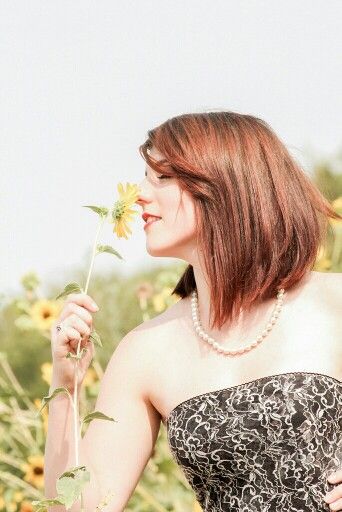 Girl smelling flowers Smelling Flower Pose Reference, Person Smelling Flower, Smelling Flowers Pose, Woman Smelling Flowers, Girl Smelling Flowers, Smelling Flowers, Waiting For Someone, Reference Poses, Floral Style