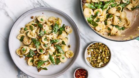 We’re throwing this pantry pasta all-star recipe a “Welcome to Summer” party with peas and mint. The buttermilk is a perfect foil for the rich butter and cheese in this glossy sauce. Unique Pasta Dishes, Pantry Pasta, Lemon Juice Recipes, Unique Pasta, Pistachio Recipes, Bon Appetite Recipes, Buttermilk Recipes, Mild Italian Sausage, Pasta Dinners