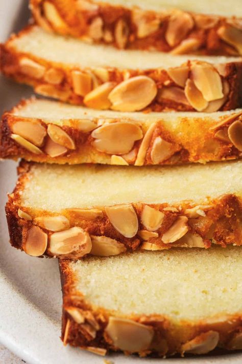 Almond Cake is a simple cake characterized by its rich, nutty flavor and moist texture! Perfect for any occasion, almond cake pairs wonderfully with a dusting of powdered sugar or a dollop of whipped cream. Quick Cake Recipes, Nutty Cake, Almond Loaf Cake, Almond Loaf, Raspberry And Almond Cake, Almond Desserts, Tea Loaf, Cake Loaf, Almond Pound Cakes