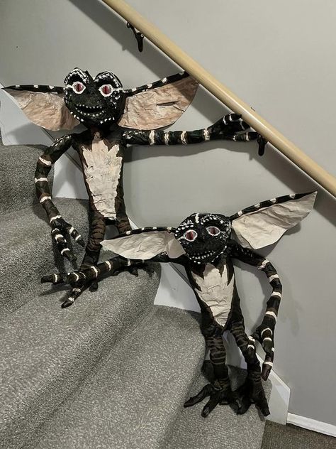 Halloween decorations on a budget/DIY | Making my own Gremlins | Facebook Gremlin Costume Diy, Gremlins Halloween Decor, Gremlin Svg Free, Gremlins Decorations, Halloween Decorations On A Budget, Gremlin Painting, Stripe Gremlins, Decorations On A Budget, Foam Head